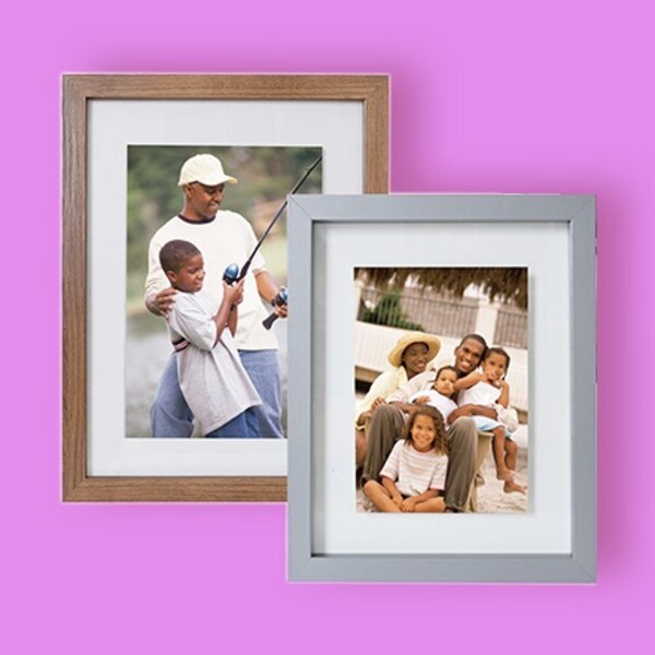 brown wood and gray frame with family photos on purple background